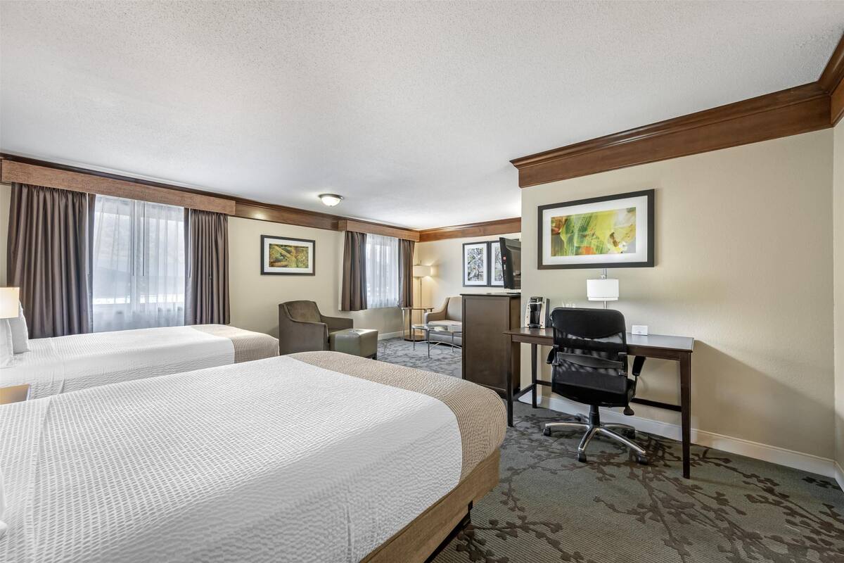 junior suite, 2 queen beds, non smoking, refrigerator & microwave (third bed is a sofabed) | 1 bedroom, iron/ironing board, free cots/infant beds, free rollaway beds