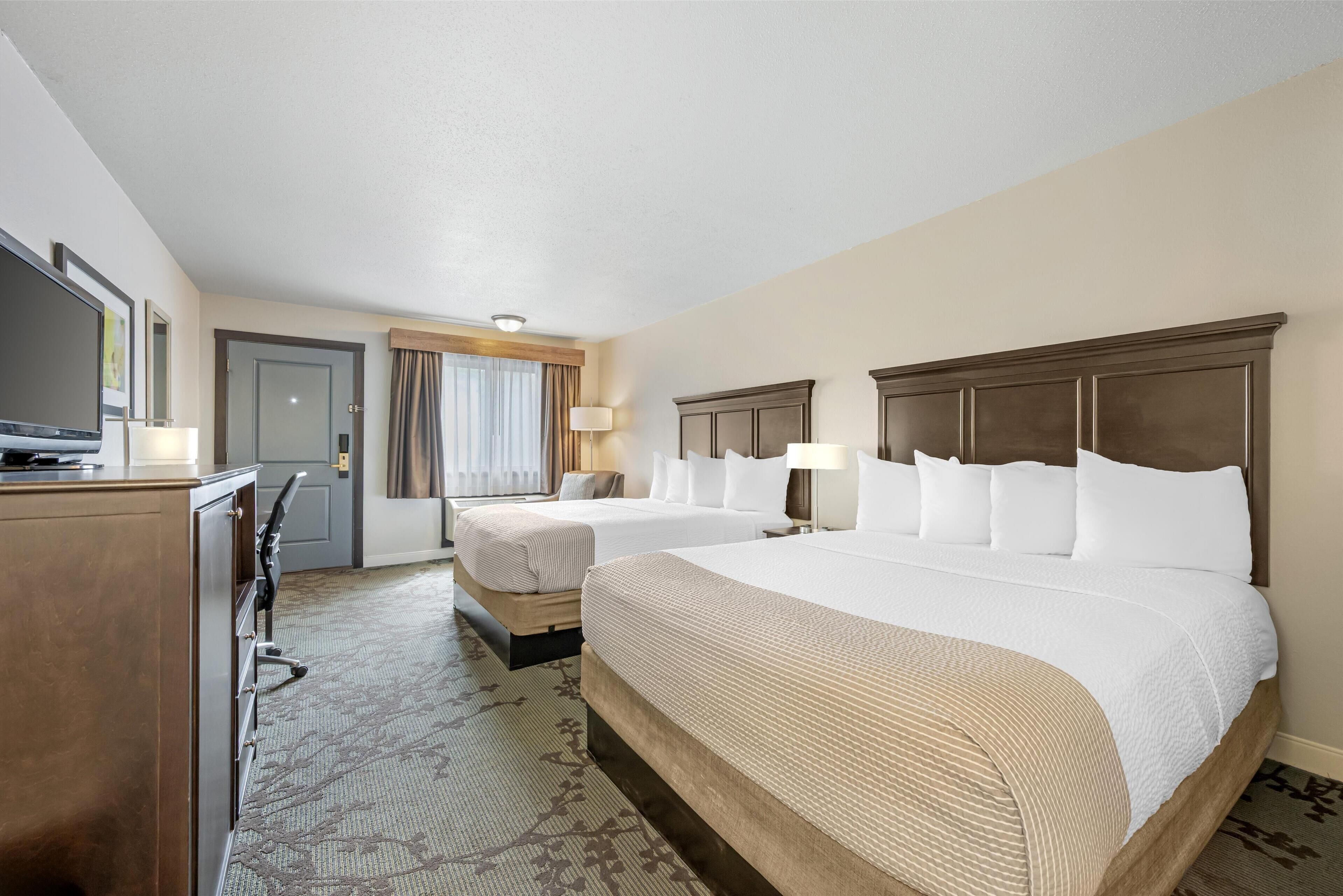 standard room, 2 queen beds, non smoking, refrigerator & microwave (1st floor) | 1 bedroom, iron/ironing board, free cots/infant beds, free rollaway beds