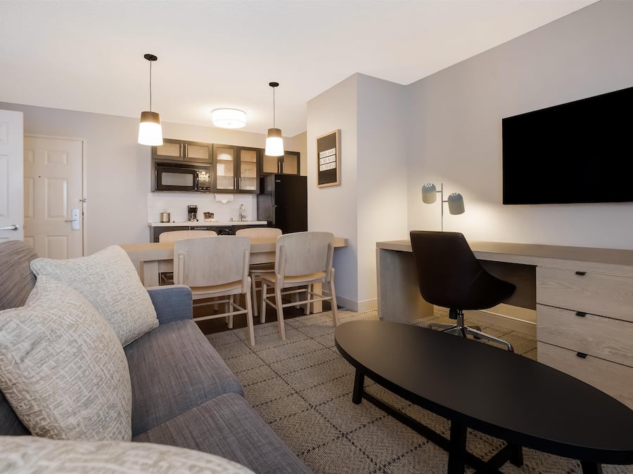 Desk, laptop workspace, blackout curtains, iron/ironing board