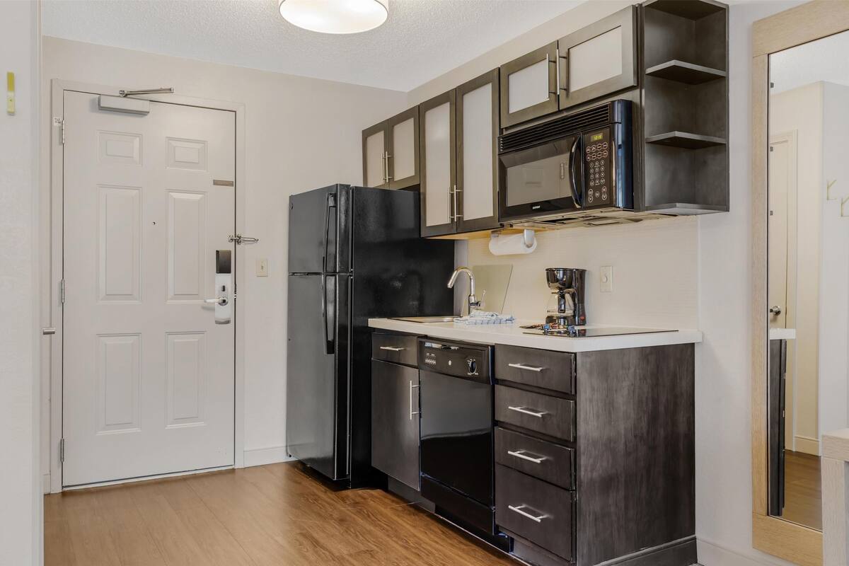 studio suite, 1 queen bed (studio) | private kitchenette | fridge, microwave, stovetop, dishwasher