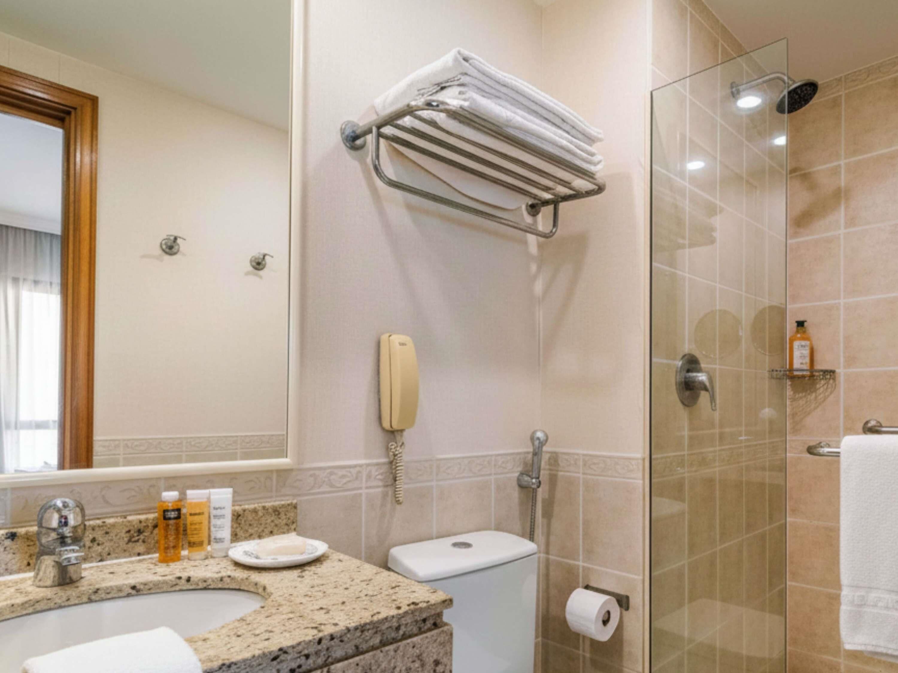 Shower, eco-friendly toiletries, hair dryer, towels