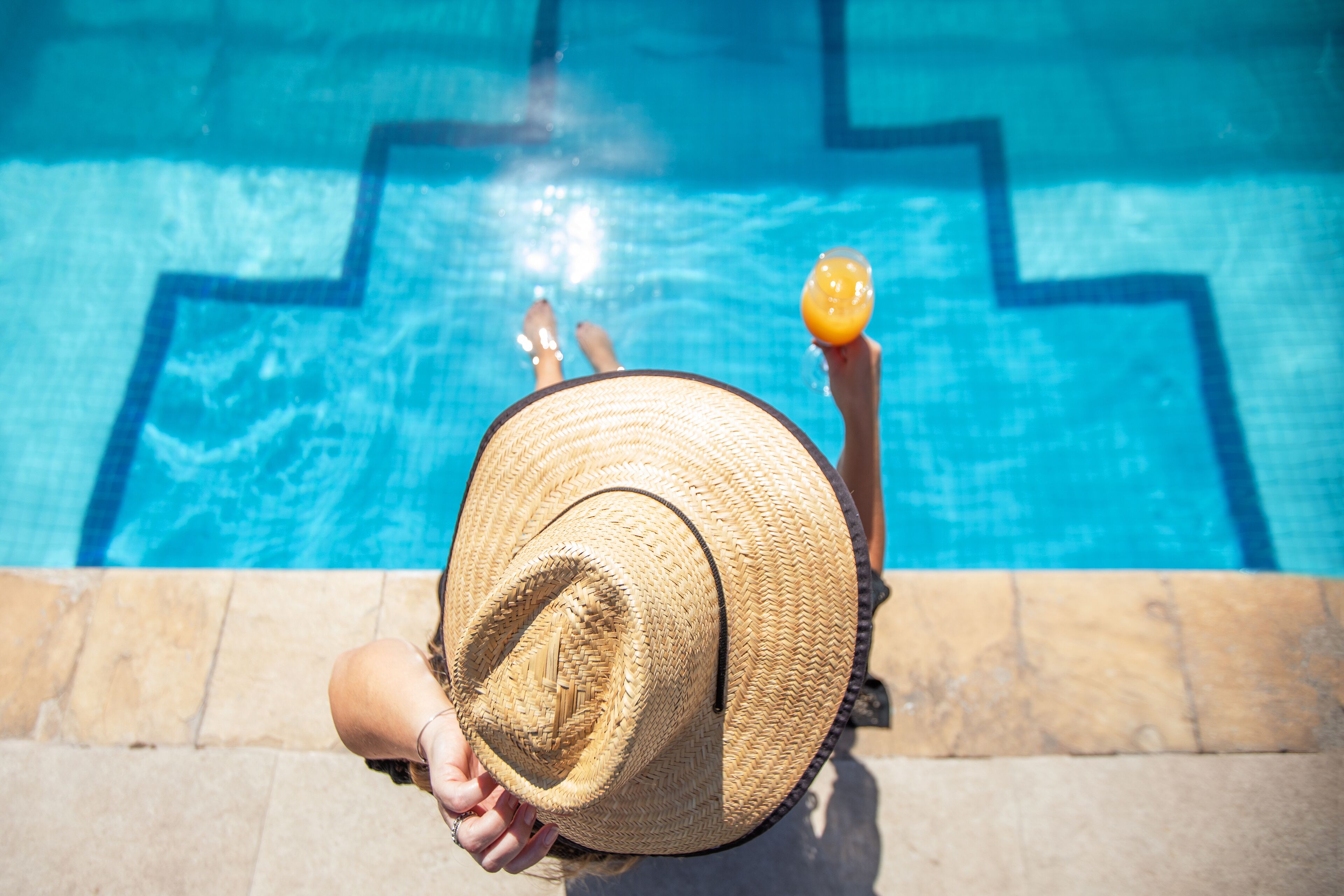 Outdoor pool, open 7:00 AM to 10:00 PM, pool umbrellas, pool loungers