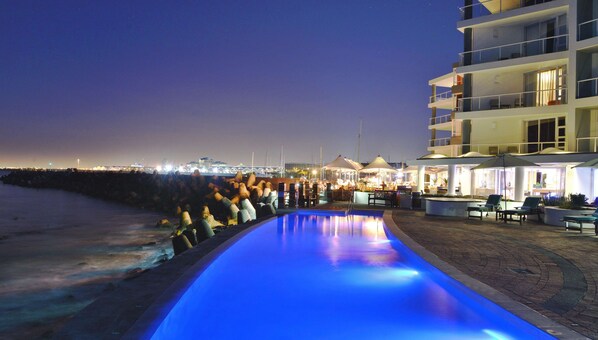 Outdoor pool, pool umbrellas, sun loungers
