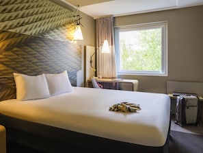 Een kluis op de kamer, een bureau, een laptopwerkplek, gratis wifi