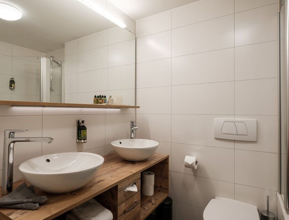 combined shower/bathtub, free toiletries, hair dryer, bathrobes