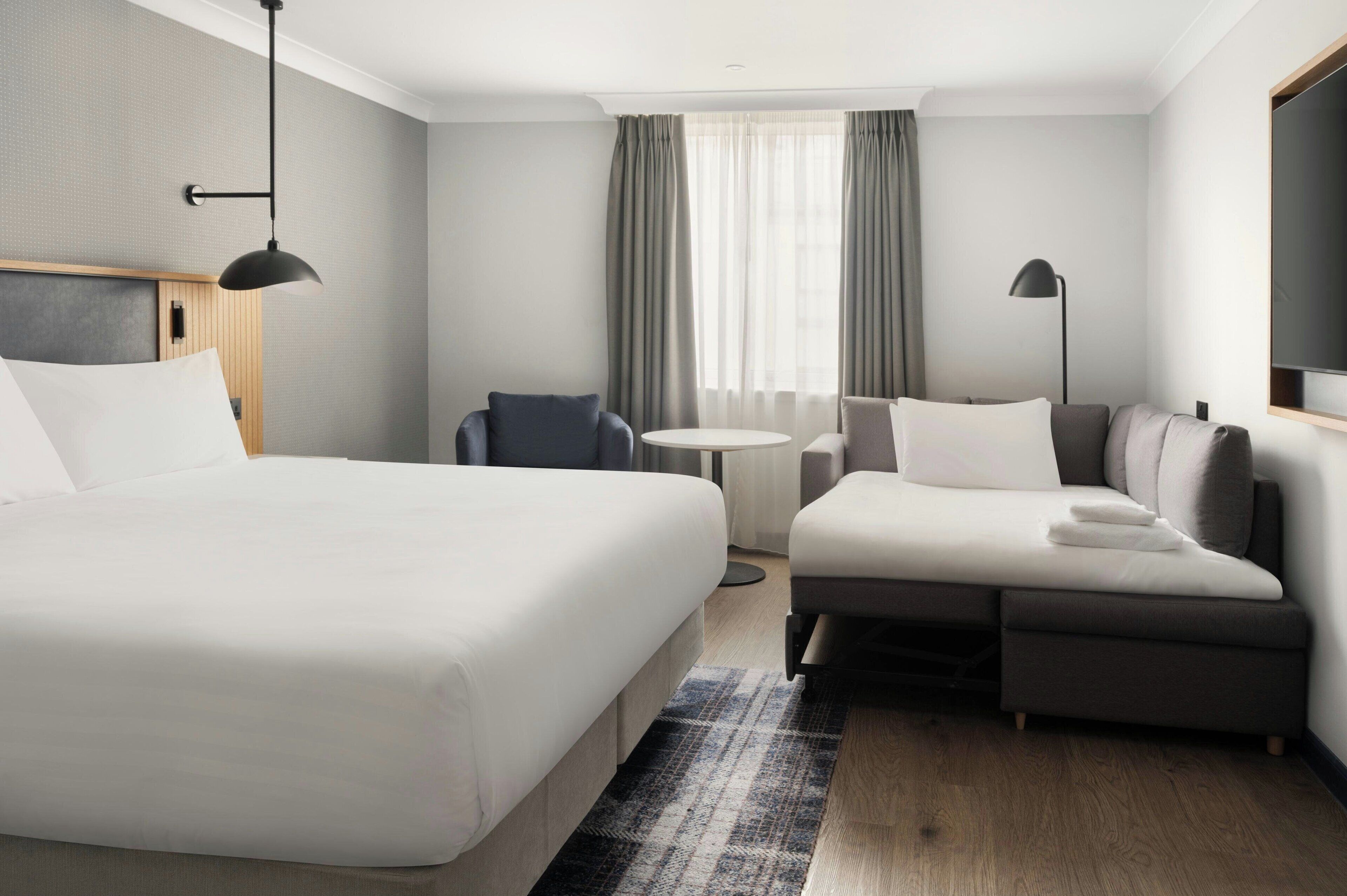 Hypo-allergenic bedding, in-room safe, blackout curtains