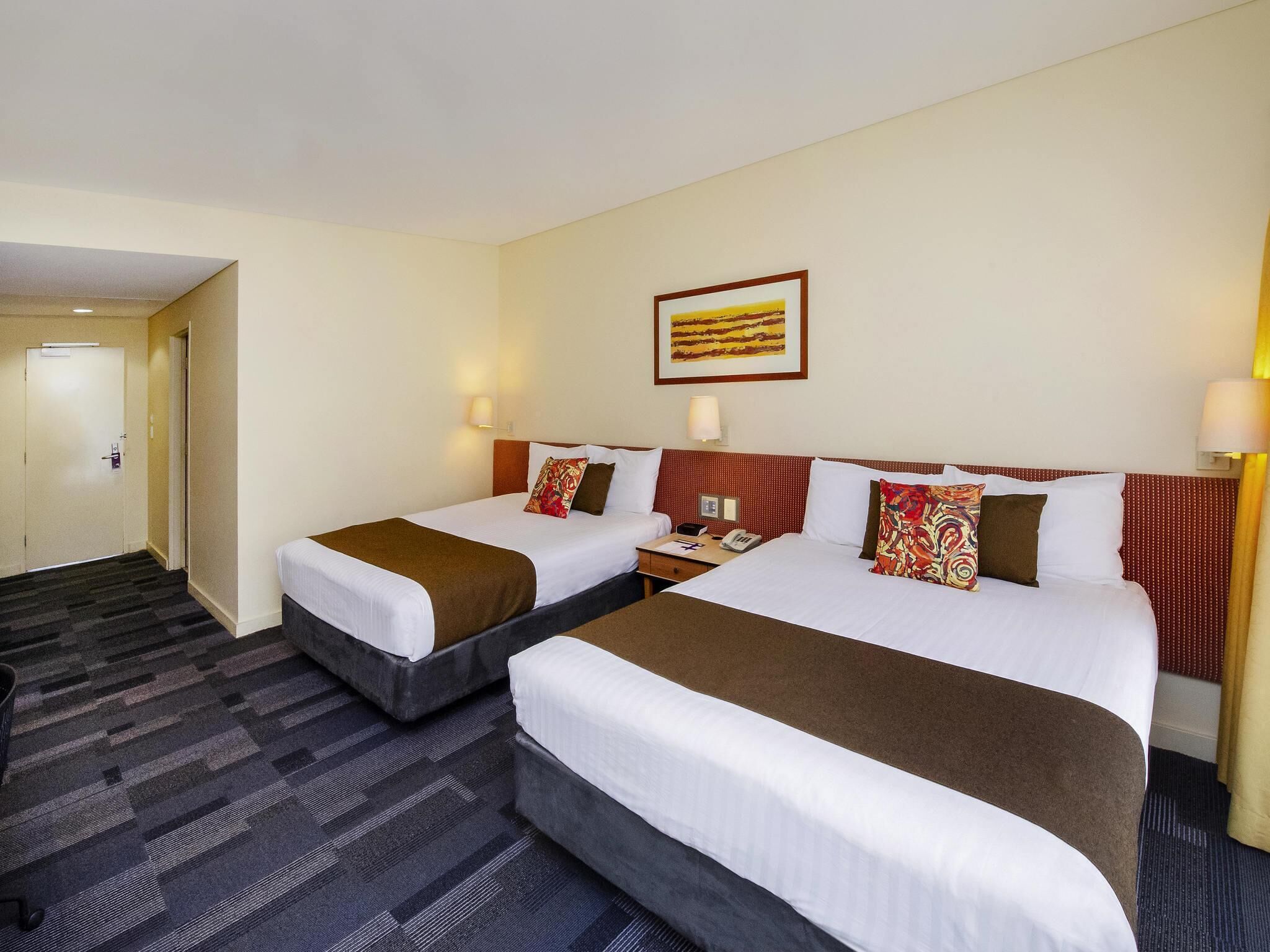 Deluxe Room, 2 Queen Beds, Garden View | Minibar, in-room safe, desk, iron/ironing board