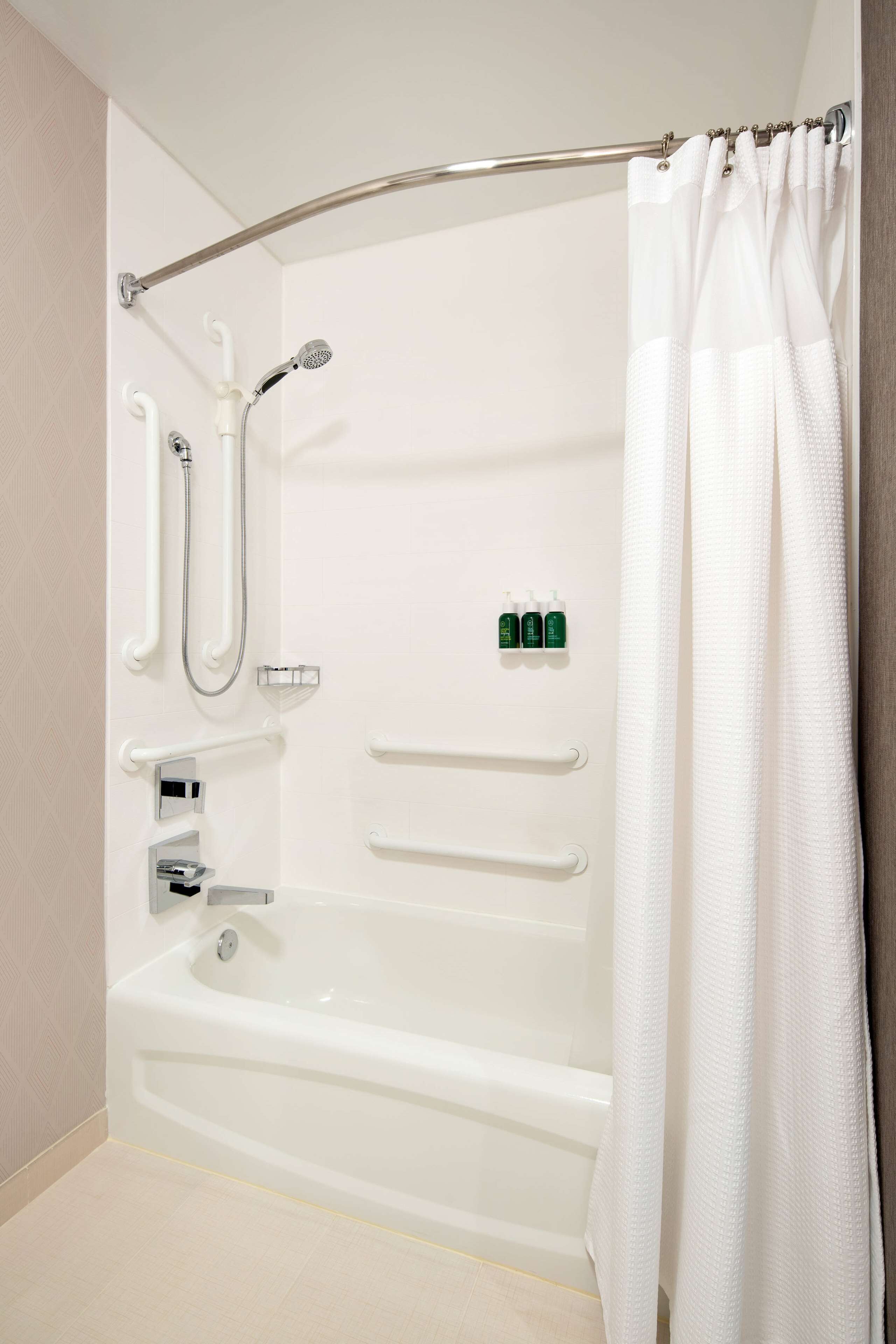 combined shower/bathtub, free toiletries, hair dryer, towels