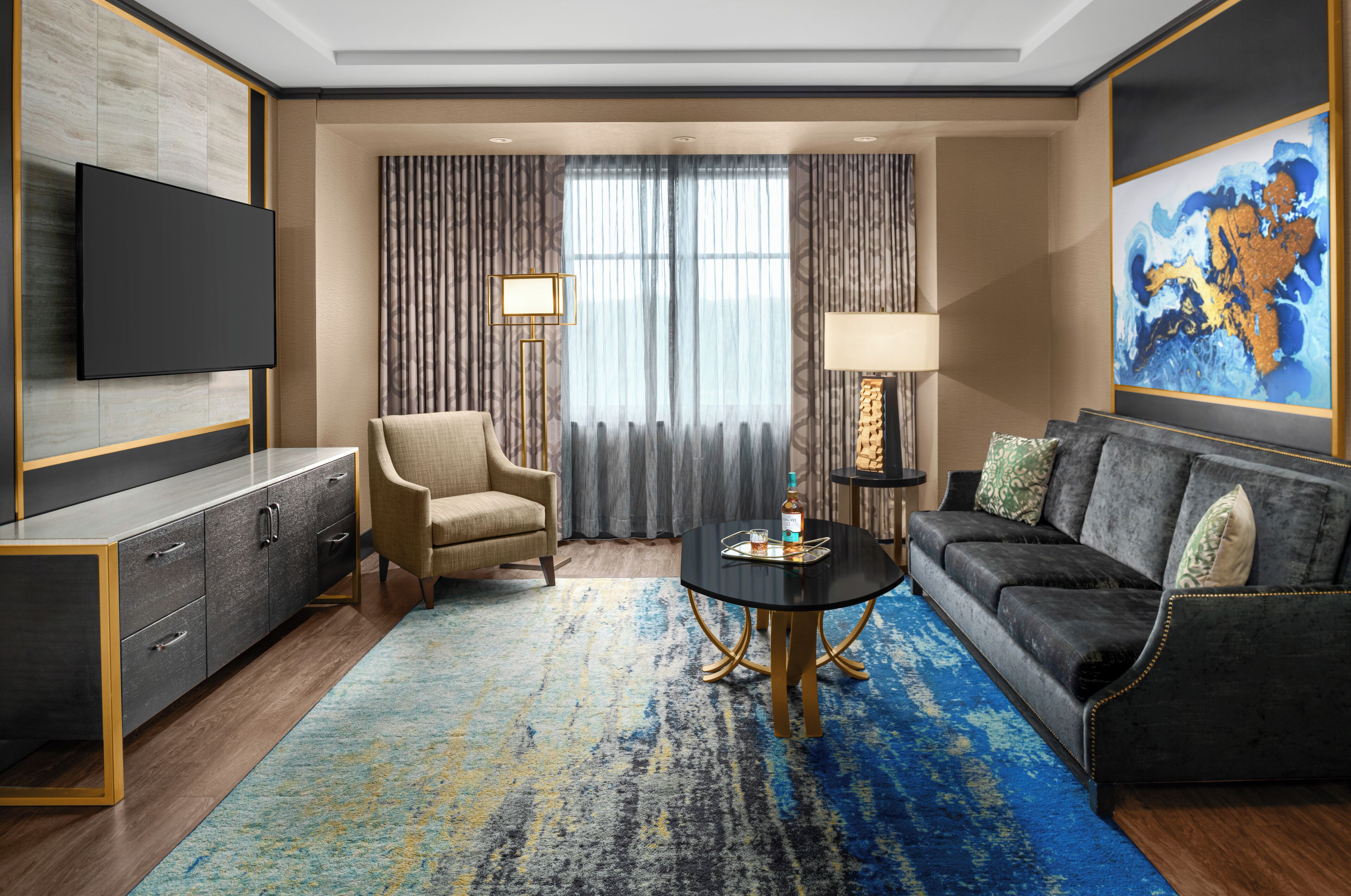 suite, 1 king bed, golf view (suite golf view king bed) | living area | flat-screen tv, pay films