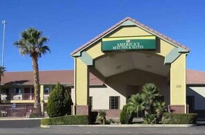 A building with a sign reading 'AMERICA'S BEST INN & SUITES' and the number '245' on the facade. - America's Best Inn & Suites St. George (St. George)