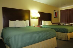 Tabla de planchar con plancha, wifi gratis, ropa de cama y despertador 