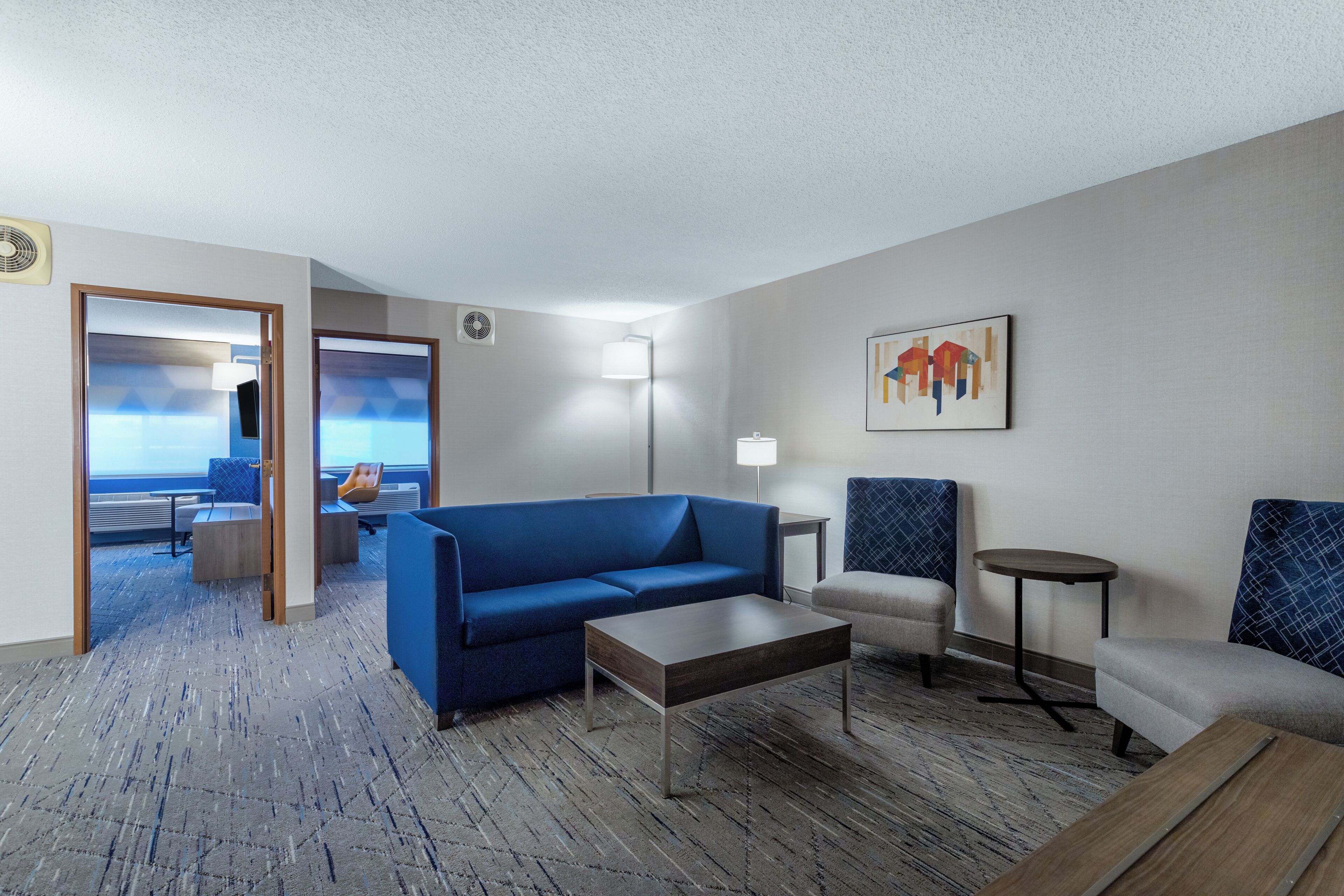 Suite, 2 Bedrooms | Living area | 37-inch flat-screen TV with satellite channels, TV