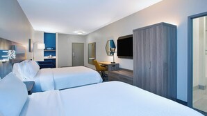 A hotel room with two beds, a desk, a chair, a wardrobe, and a TV. - Holiday Inn Express & Suites Wauseon by IHG (Wauseon)