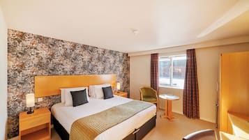 Desk, laptop workspace, blackout drapes, iron/ironing board