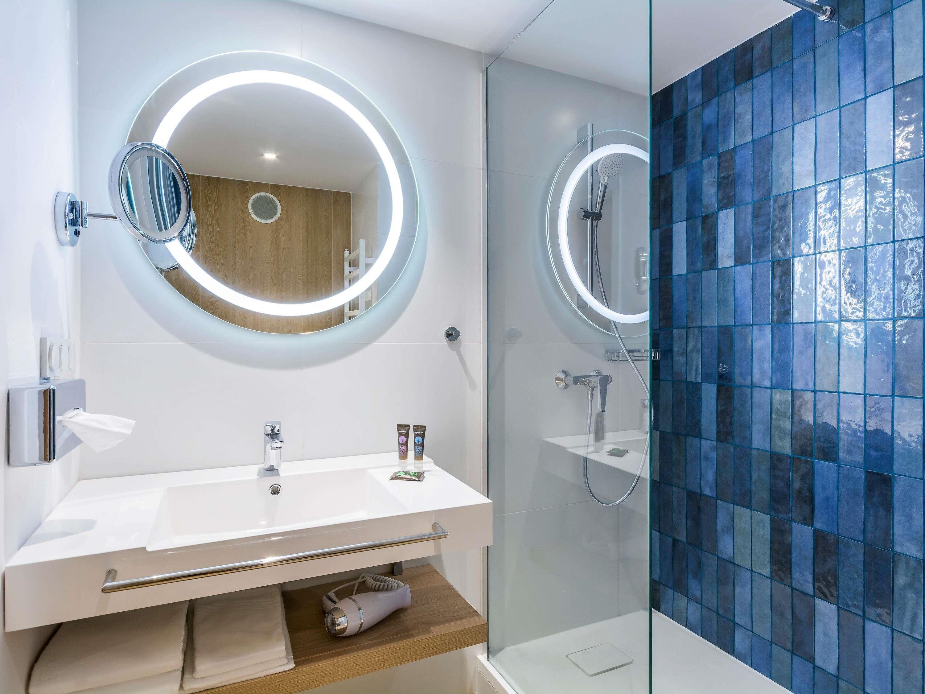 Eco-friendly toiletries, hair dryer, towels, soap