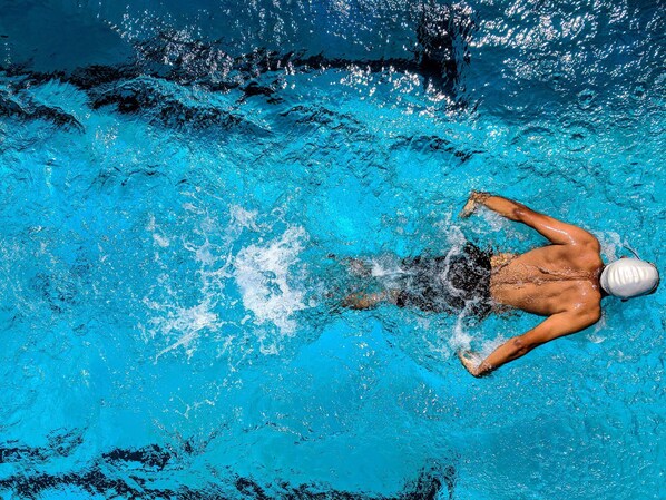 Indoor pool, open 7:00 AM to 9:30 PM, lifeguards on site