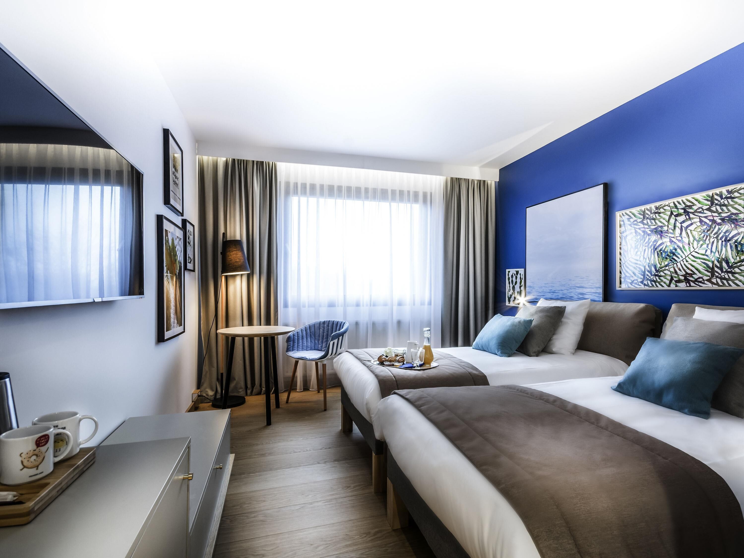 Desk, laptop workspace, blackout drapes, soundproofing