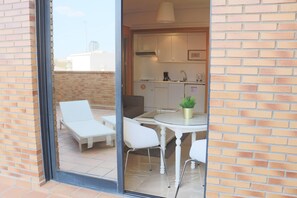 Apartamento superior triple, terraza | Terraza o patio