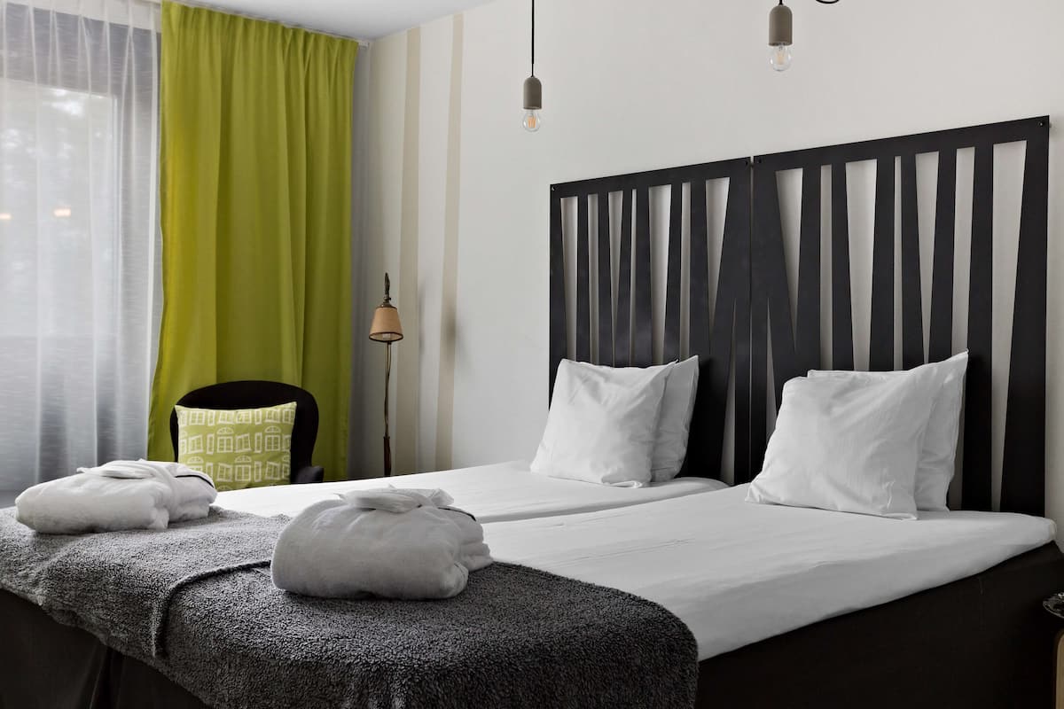 individually decorated, desk, laptop workspace, blackout curtains