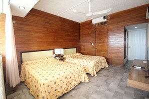 Standard Room, 2 Double Beds, Ocean View | Down comforters, in-room safe, individually decorated