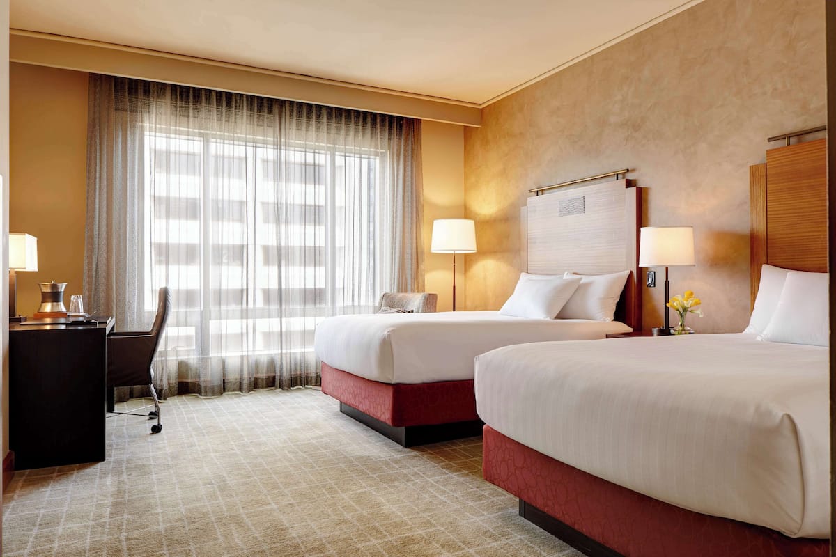 Premium bedding, pillow-top beds, in-room safe, desk