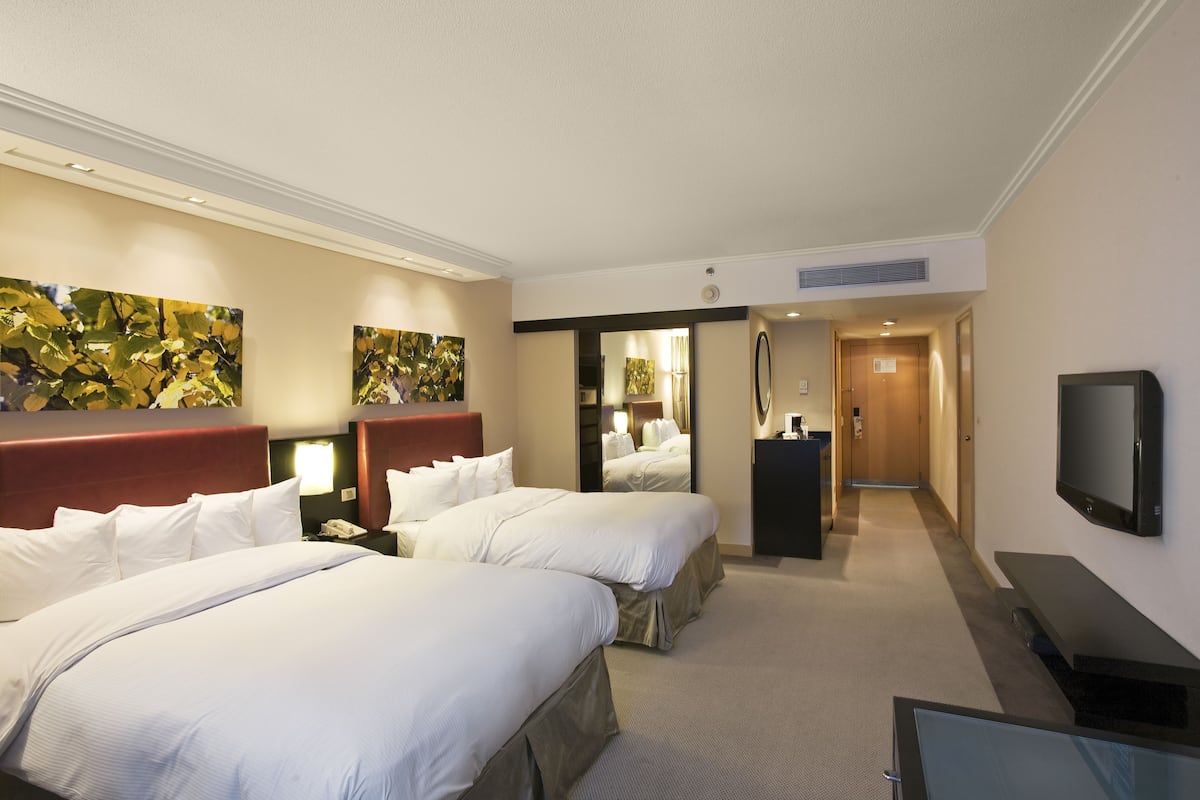 Premium bedding, down comforters, pillowtop beds, in-room safe