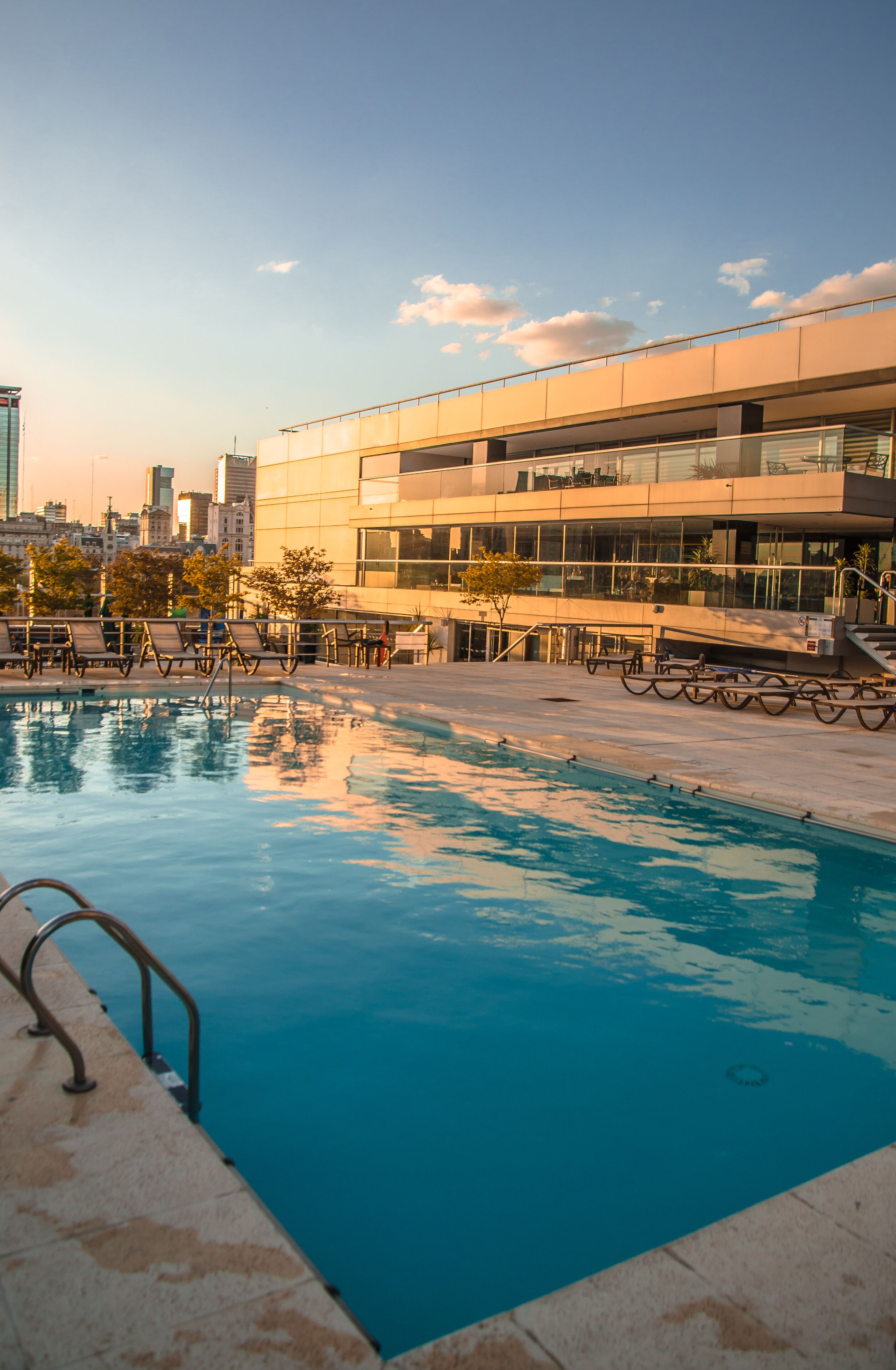 Outdoor pool, pool umbrellas, sun loungers