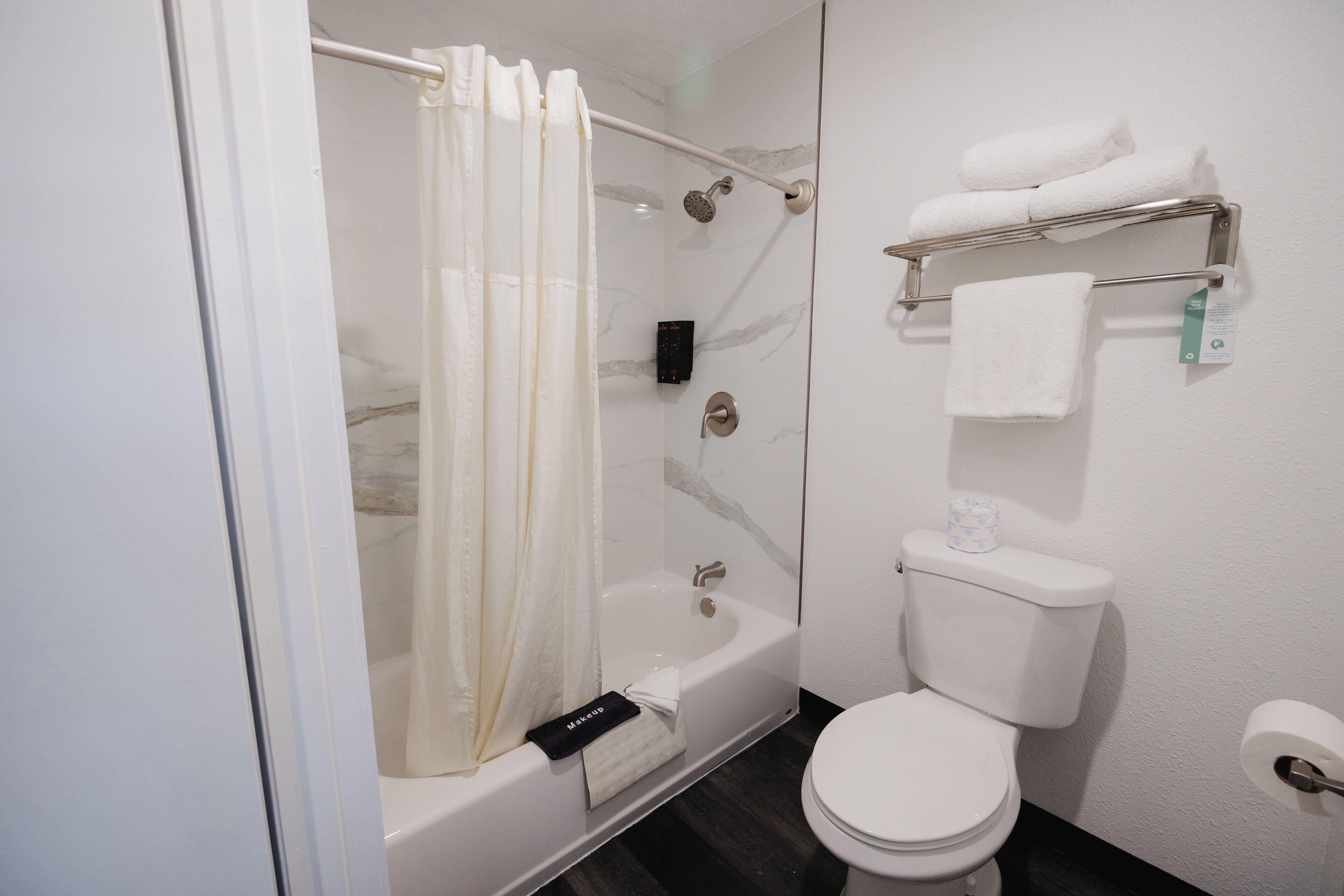 combined shower/bathtub, free toiletries, hair dryer, towels