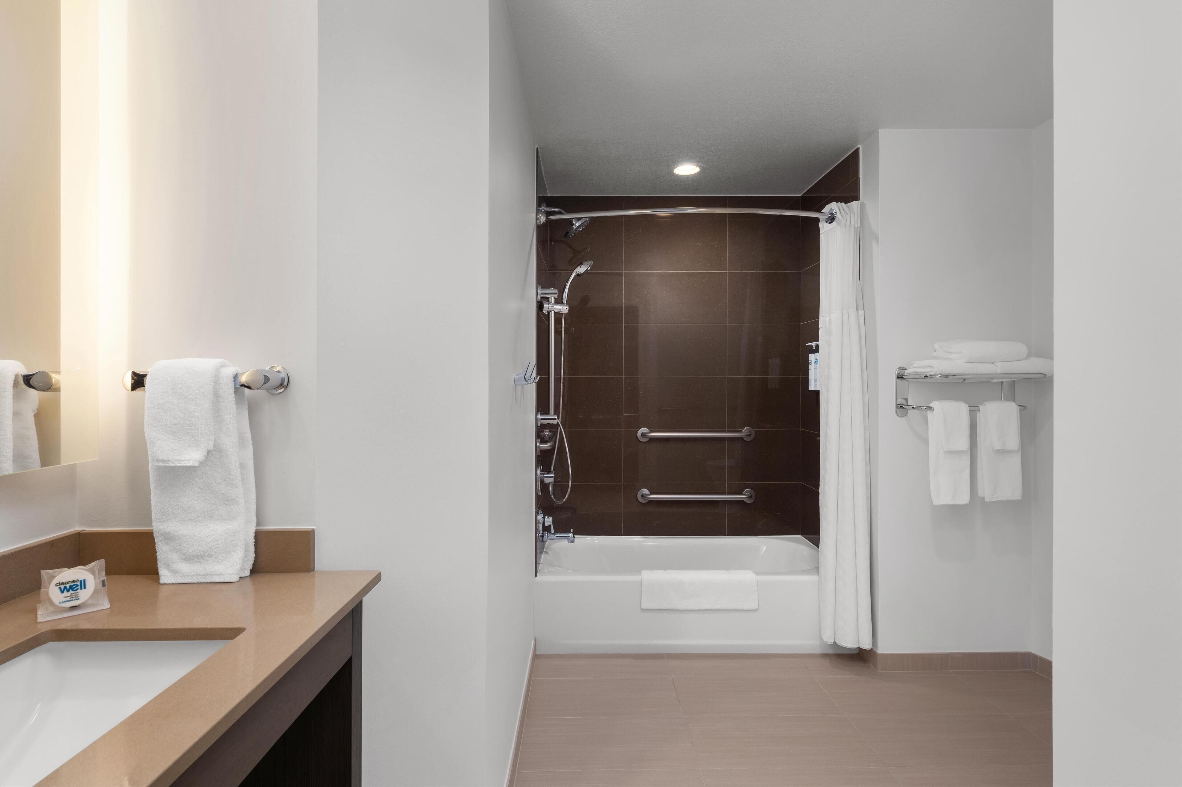 suite, 1 queen bed, accessible, bathtub | bathroom | designer toiletries, hair dryer, towels
