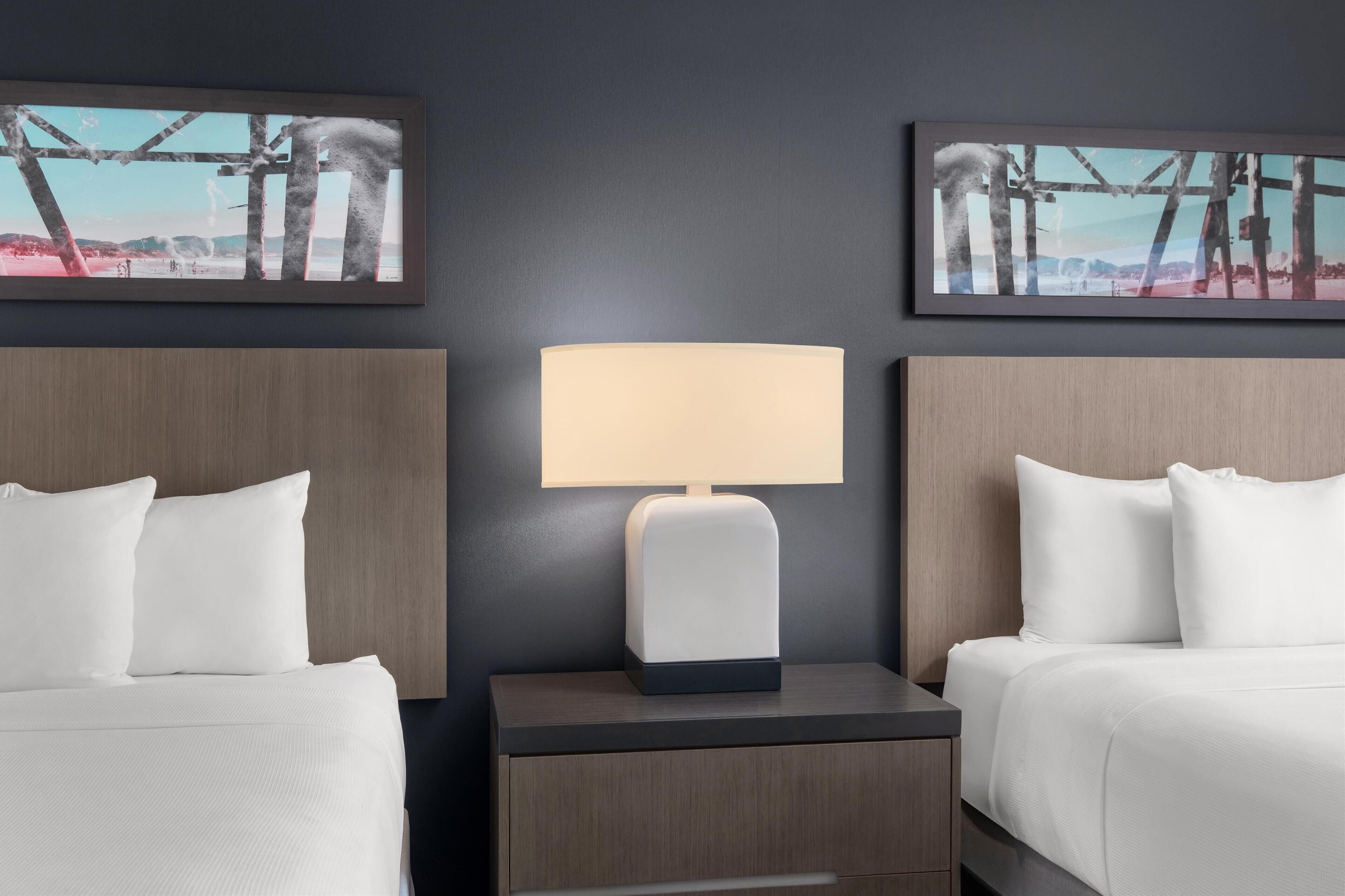 suite, multiple beds, kitchen | in-room safe, desk, blackout curtains, iron/ironing board