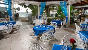 Breakfast, lunch served; local and international cuisine, beach views