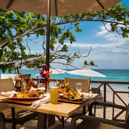 Breakfast, lunch served; local and international cuisine, beach views