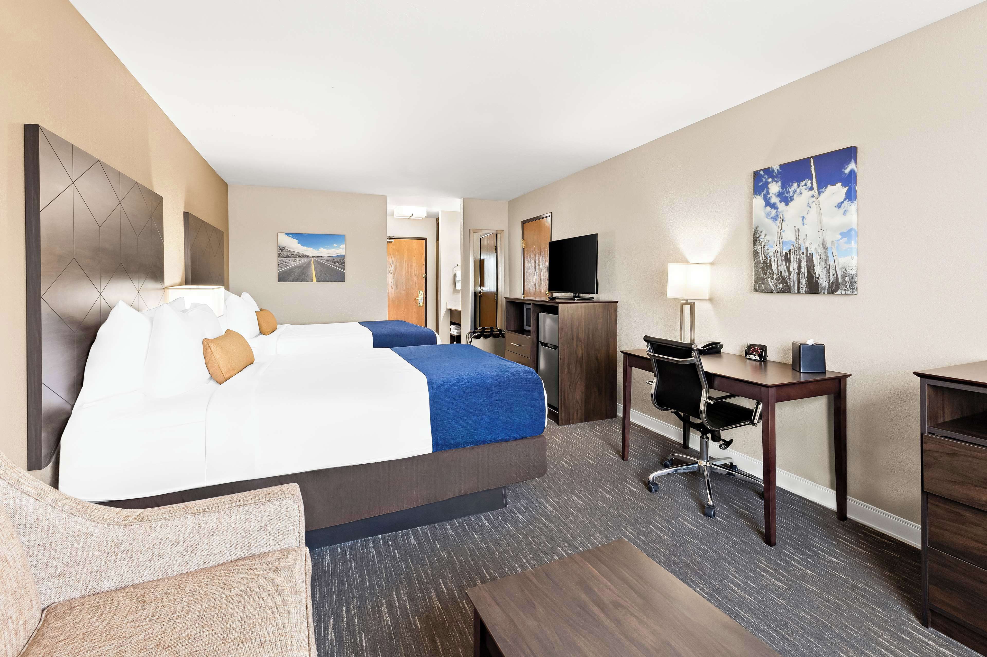 family suite, multiple beds, non smoking, microwave (with sofabed) | desk, laptop workspace, blackout curtains, iron/ironing board