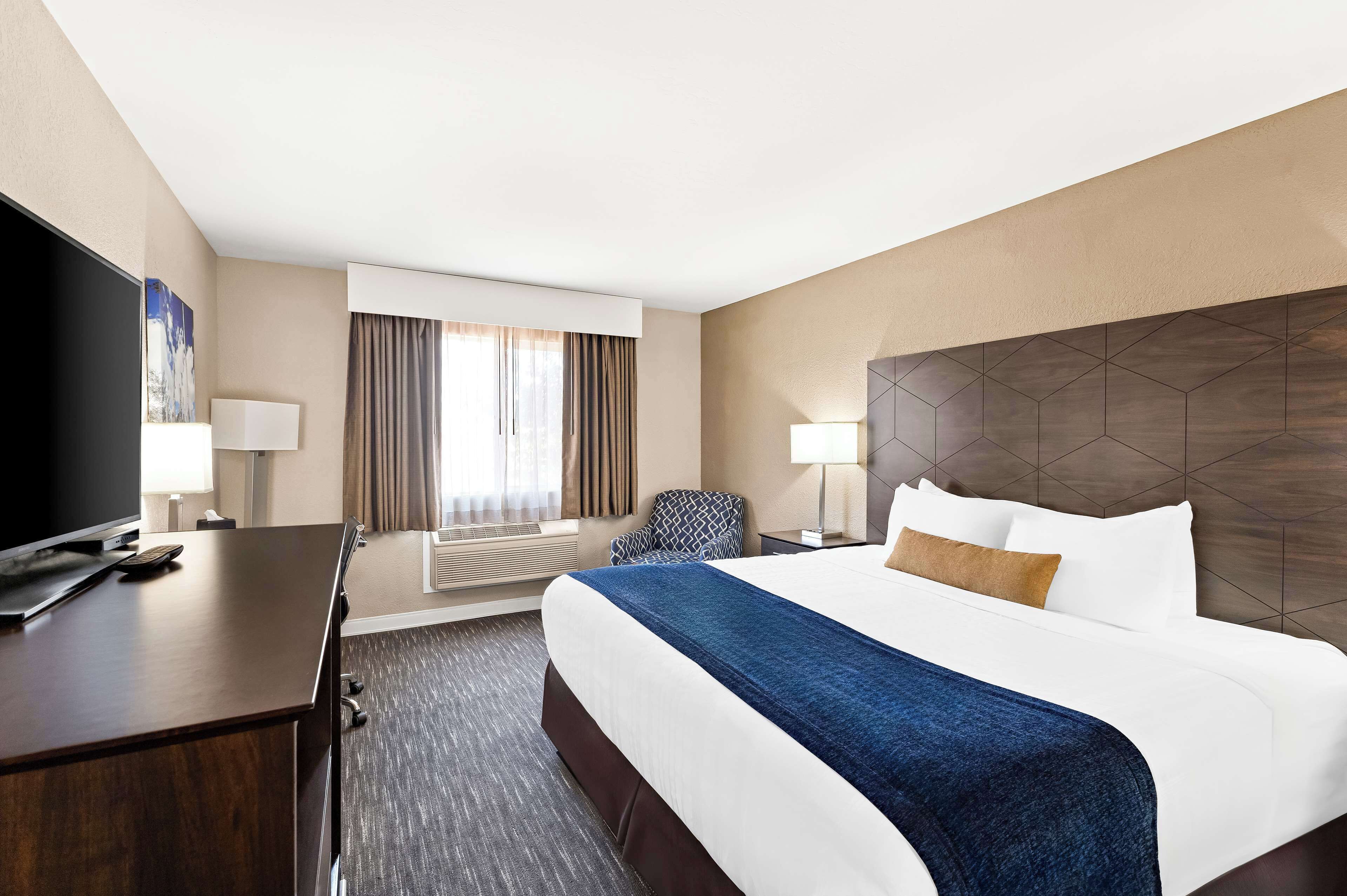 standard room, 1 king bed, non smoking, refrigerator | desk, laptop workspace, blackout curtains, iron/ironing board