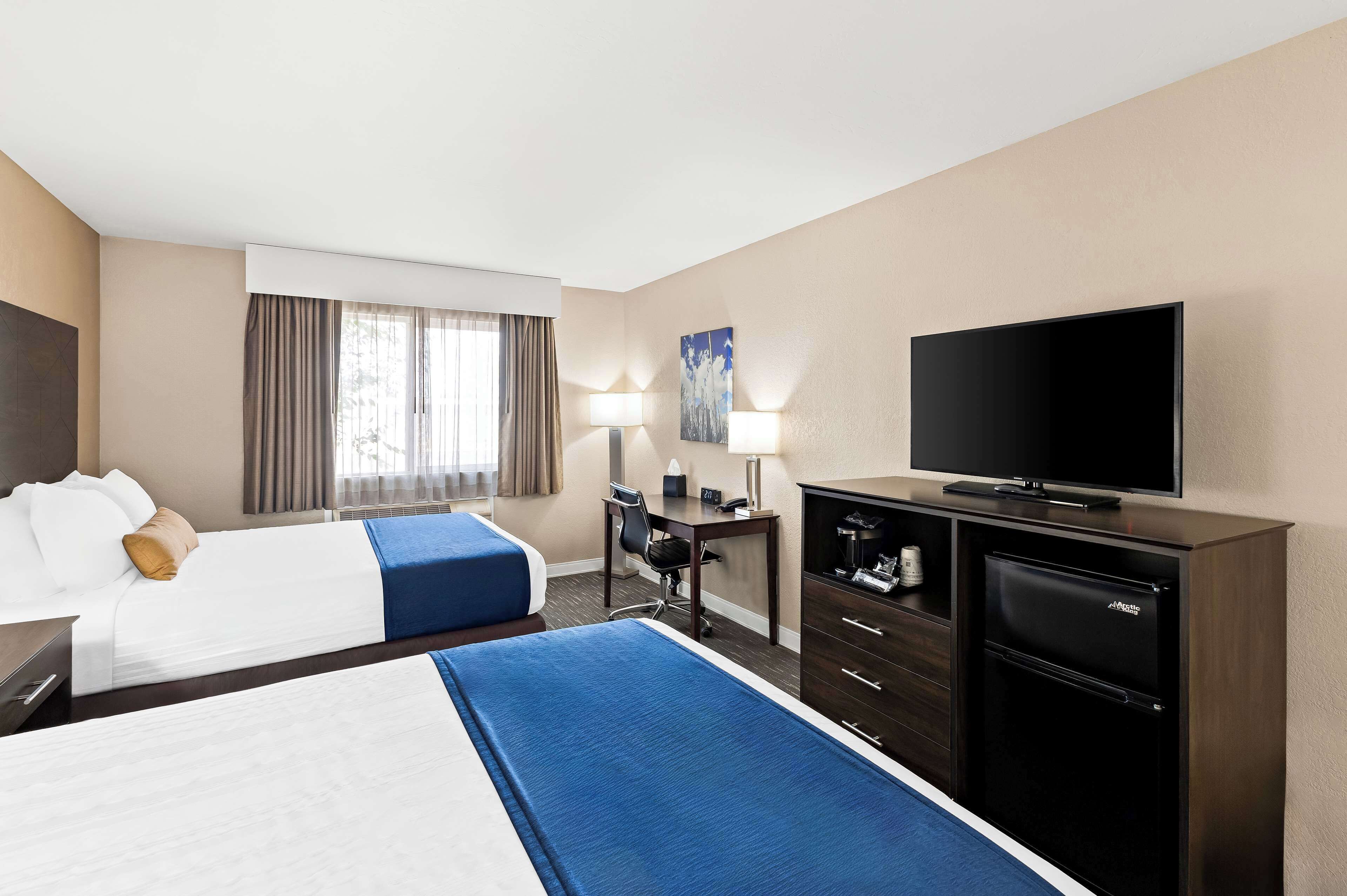 standard room, 2 queen beds, non smoking, refrigerator | desk, laptop workspace, blackout curtains, iron/ironing board