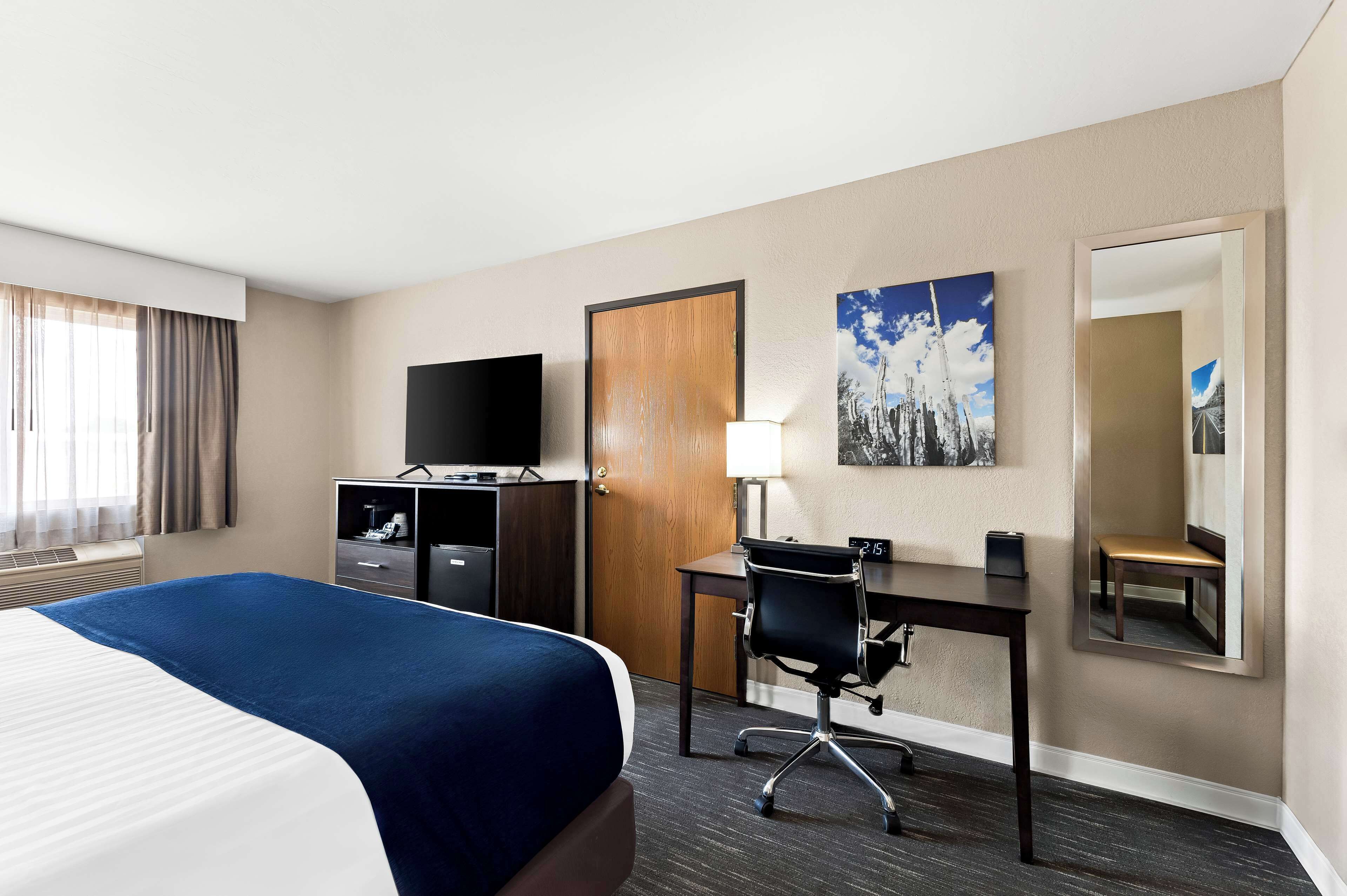 standard room, 1 king bed, non smoking, refrigerator | desk, laptop workspace, blackout curtains, iron/ironing board