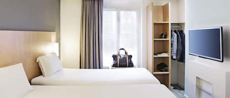 Premium bedding, desk, blackout drapes, soundproofing