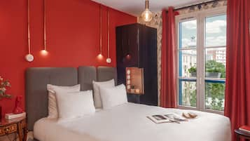 Premium bedding, in-room safe, desk, soundproofing