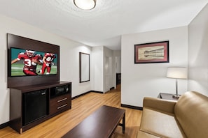 Desk, laptop workspace, blackout drapes, iron/ironing board