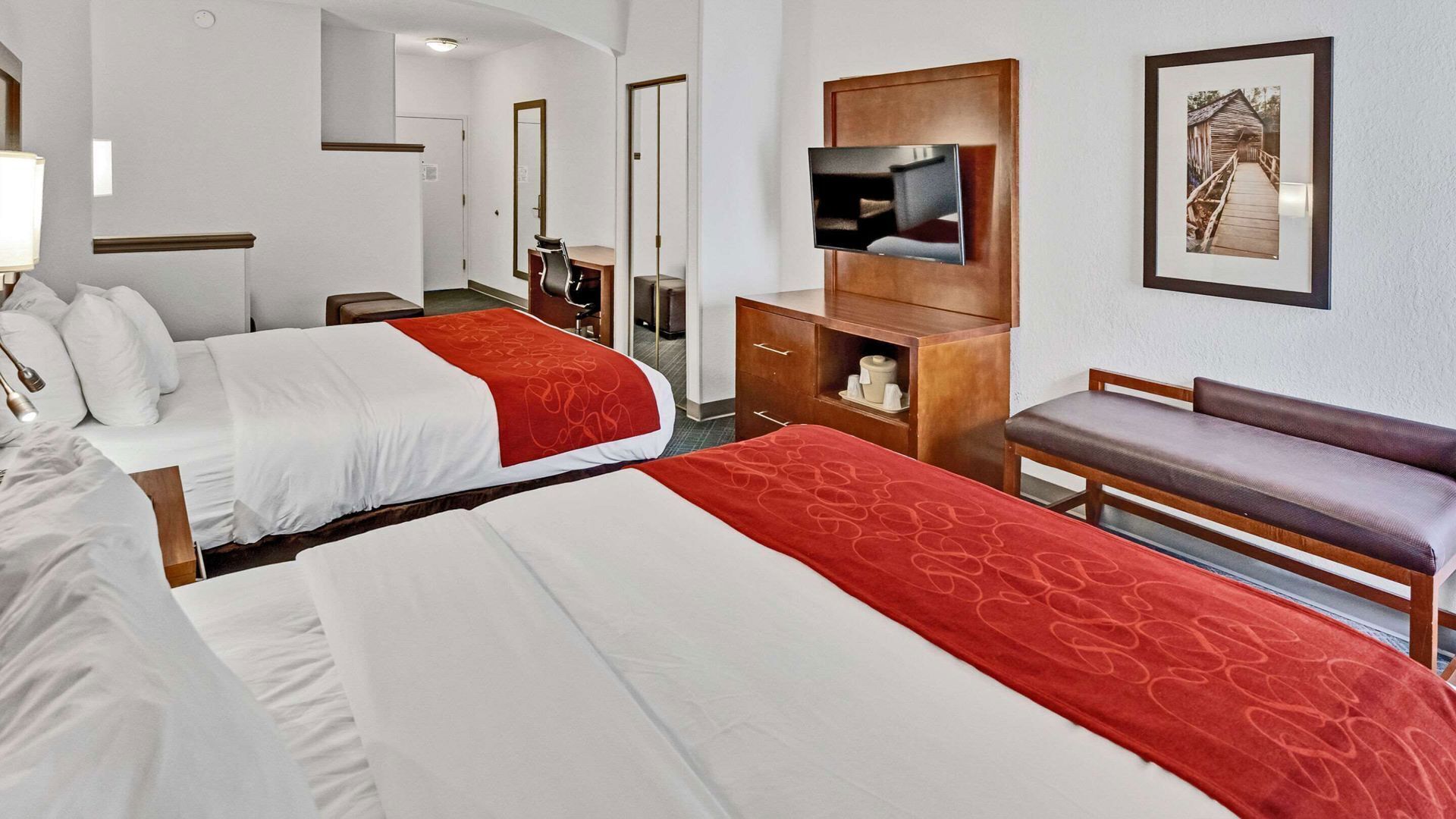 Premium bedding, pillowtop beds, desk, laptop workspace