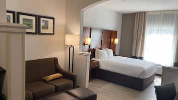 Premium bedding, pillow-top beds, desk, laptop workspace
