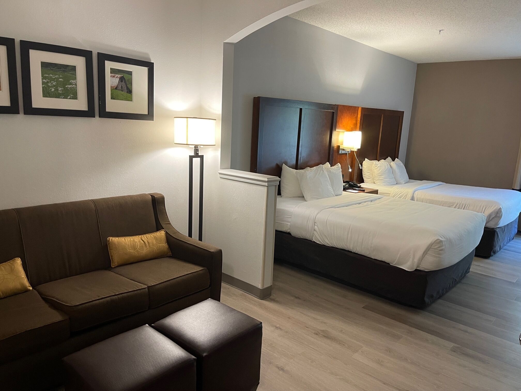 premium bedding, pillow-top beds, desk, laptop workspace