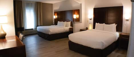 Premium bedding, pillowtop beds, desk, laptop workspace