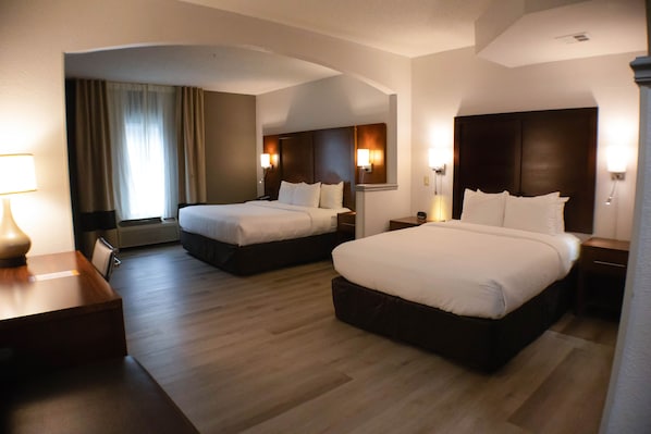 Premium bedding, desk, laptop workspace, blackout curtains