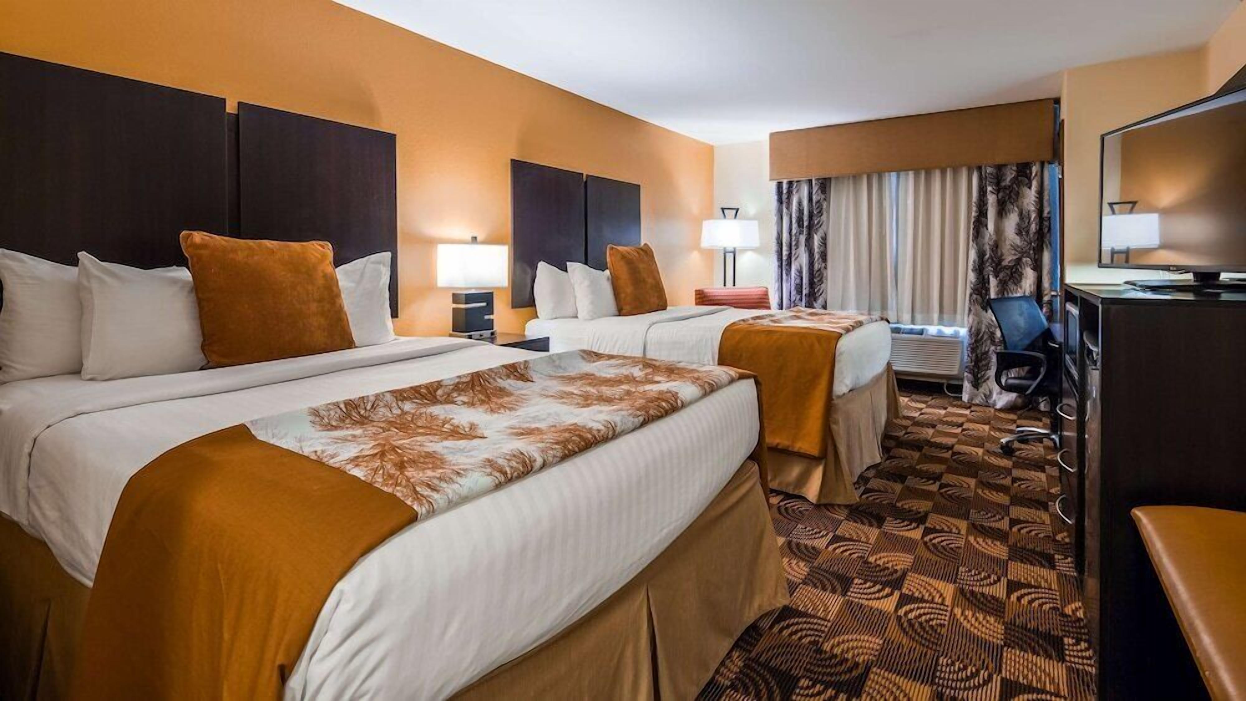Premium bedding, pillowtop beds, desk, laptop workspace
