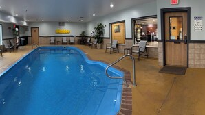 An indoor swimming pool with chairs and a reception area. - Best Western Plus Whitewater Inn (Harrison)