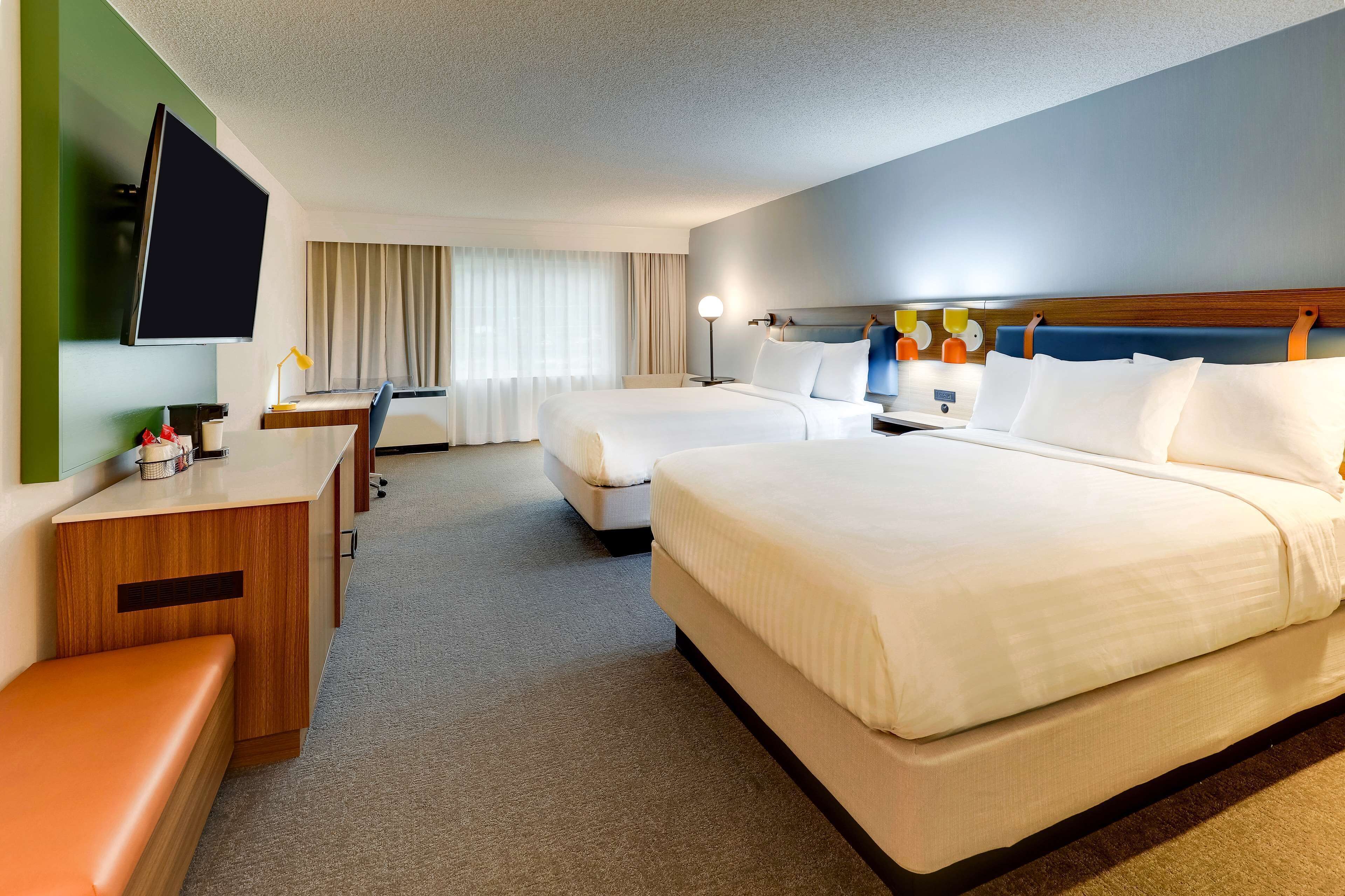 deluxe room, 2 queen beds | egyptian cotton sheets, premium bedding, desk, laptop workspace