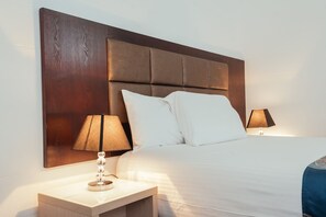 Basic Double Room - No Windows, Not Pet Friendly | Desk, laptop workspace, soundproofing, iron/ironing board - Coffs Windmill Motel (Coffs Harbour)