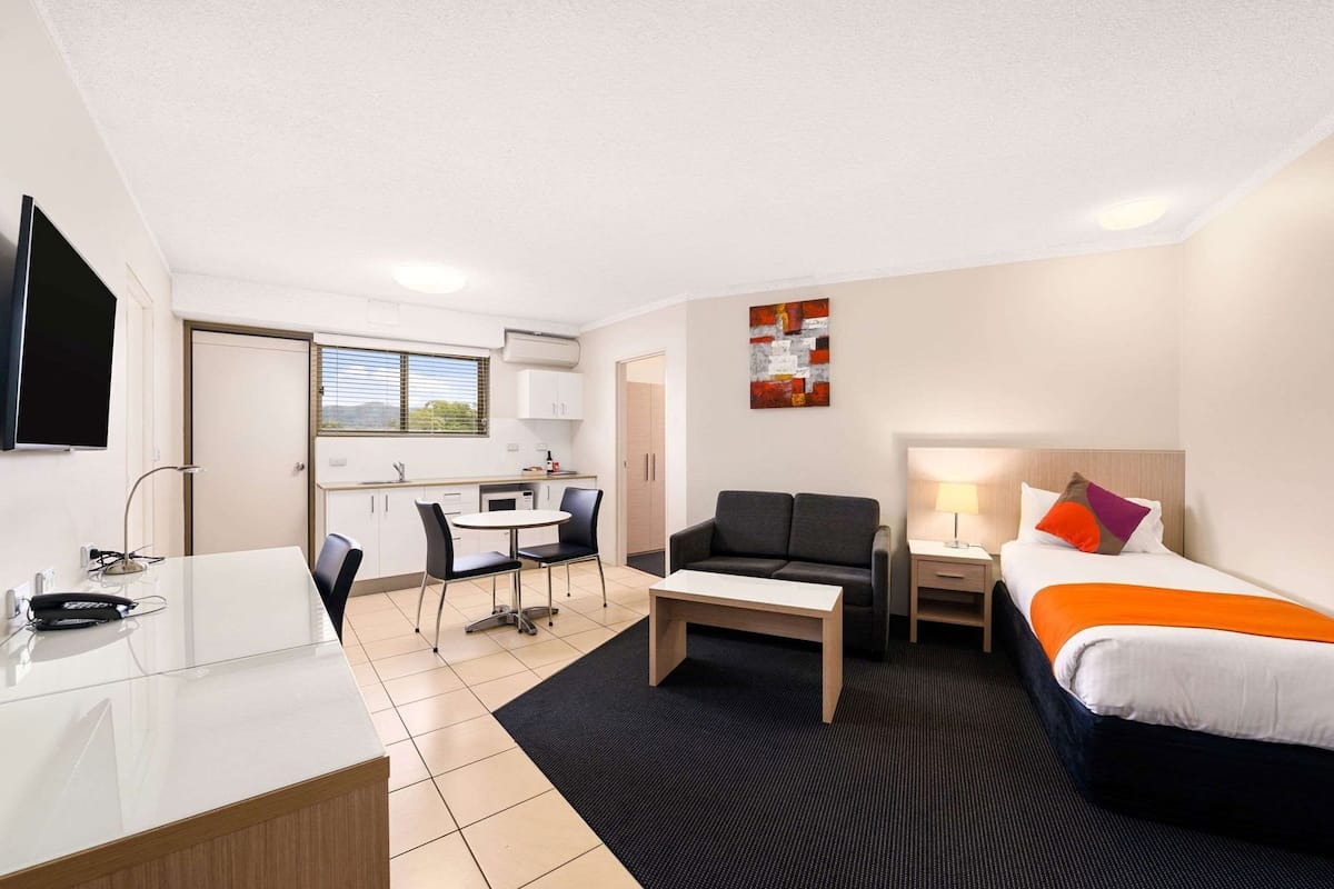 Desk, laptop workspace, blackout drapes, soundproofing