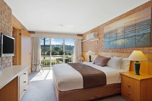 Deluxe Room, 1 King Bed | Desk, iron/ironing board, free WiFi, bed sheets